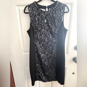 Lady Dutch XL fitted dress. Gold chain accents around neckline & hip area.